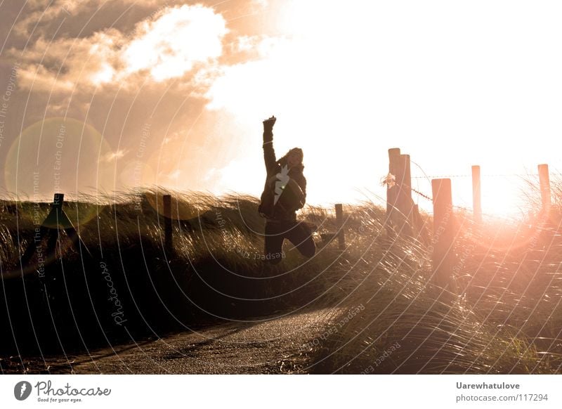 Pure pleasures jump Joy Jump Photographer Horizon Sunlight Light Back-light Beach Ocean Going Bag Clouds Magic Netherlands Den Haag Contentment Laughter