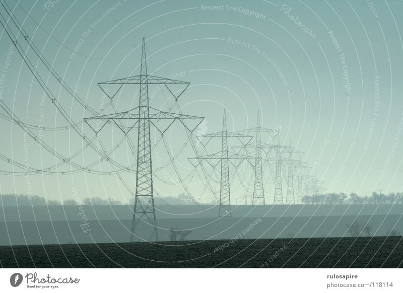 Motorway II Electricity Electricity pylon Metal Grating Gray Manmade structures Dangerous Yellow White Winter Sharp Flashy Field Brown Agriculture Renewable