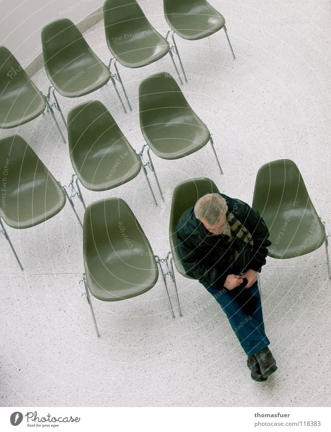 test sitting, chairs with man Bird's-eye view Chair Event Speech Television Audience Undisturbed Interesting Disinterest Boredom Waiting area Waiting room