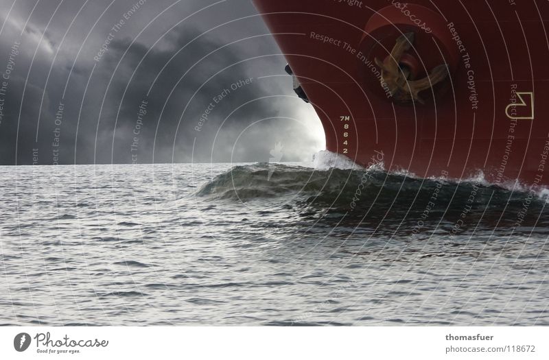 Ship bow in motion in front of threatening cloud Ocean Watercraft Sailing Clouds Force Waterway Trust Sky Thunder and lightning rising storm Threat Caution