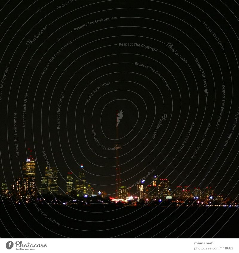 Toronto's skyline at night Night Dark High-rise Light Window Office building House (Residential Structure) Town Canada Skyline CN Tower Water Lamp