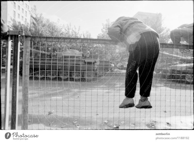 May Demonstration, 1984 May 1 Military Parade Soldier Military vehicle GDR Tank T 34 Fence Wire netting Child Audience Hang Climbing Copy Space