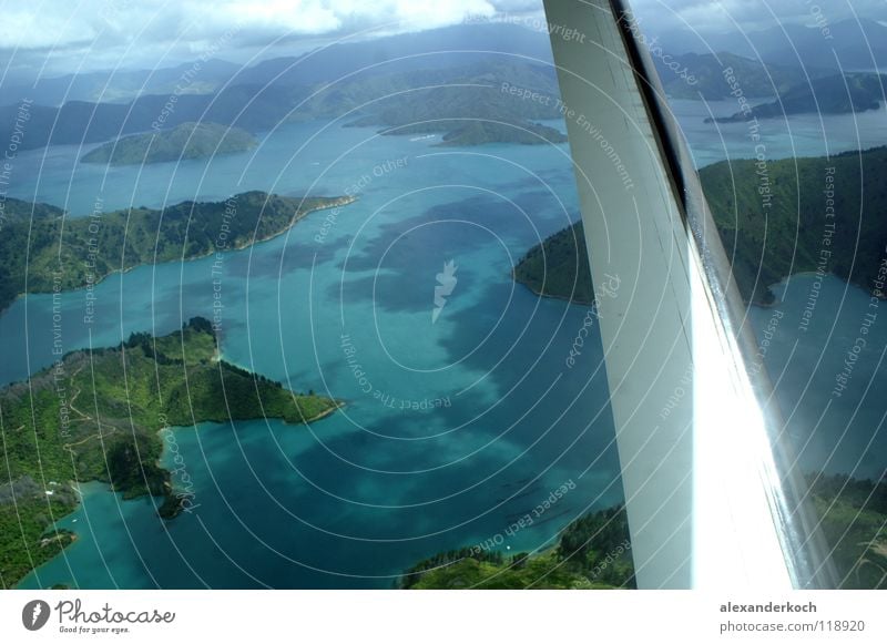 Tropical Tropical Airplane Ocean Turquoise Vacation & Travel Wing Glimmer New Zealand Flying Island Fjord Blue pictone cook strait