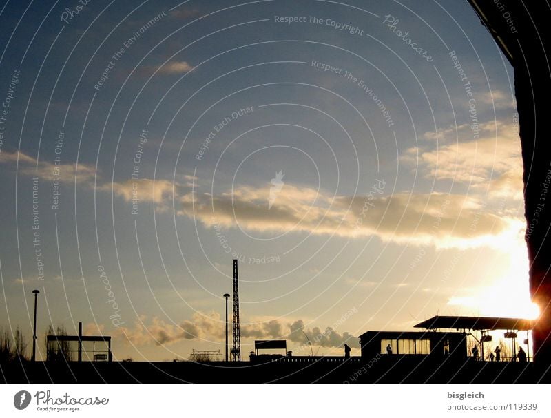 Ostkreuz (Berlin) I Colour photo Exterior shot Copy Space top Evening Light Shadow Silhouette Back-light Sun Sky Clouds Germany Europe Train station