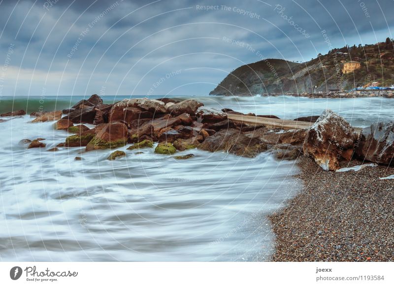 Levanto Water Sky Clouds Bad weather Waves Coast Beach Italy Village Stone Threat Dark Blue Brown Gray White Environment Mole Dynamics Colour photo