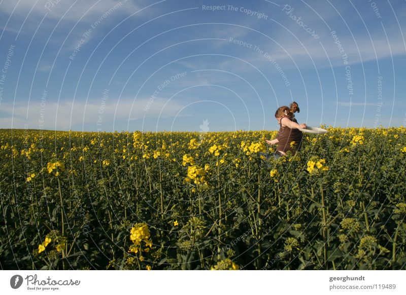 Franzi goes yellow Field Canola Canola field Yellow Green Summer Clouds Meadow Playing Girl Woman Mecklenburg-Western Pomerania Joy Blue Sky Walking run away