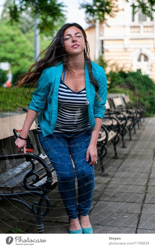 A young woman sitting on a garden bench Young woman Youth (Young adults) Life 1 Human being 18 - 30 years Adults Sunlight Summer Beautiful weather Park Sofia