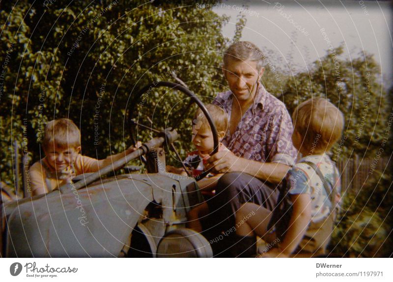 Back then Child Gardening Agriculture Forestry Human being Boy (child) Grandfather 4 Landscape Sun Beautiful weather Tractor Workwear Work and employment