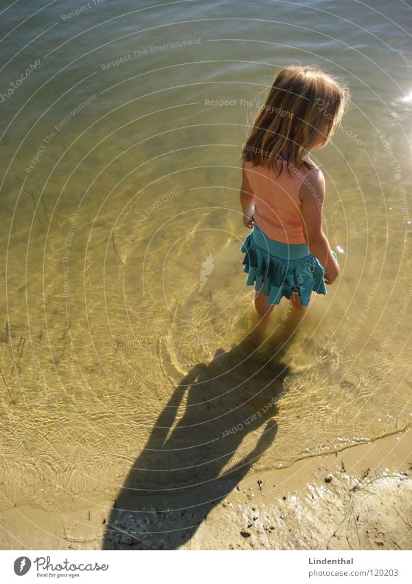 Me and the lake Child Girl Stand Lake Beach Wet Dress Turquoise Top Water Calm sea river Feet sun