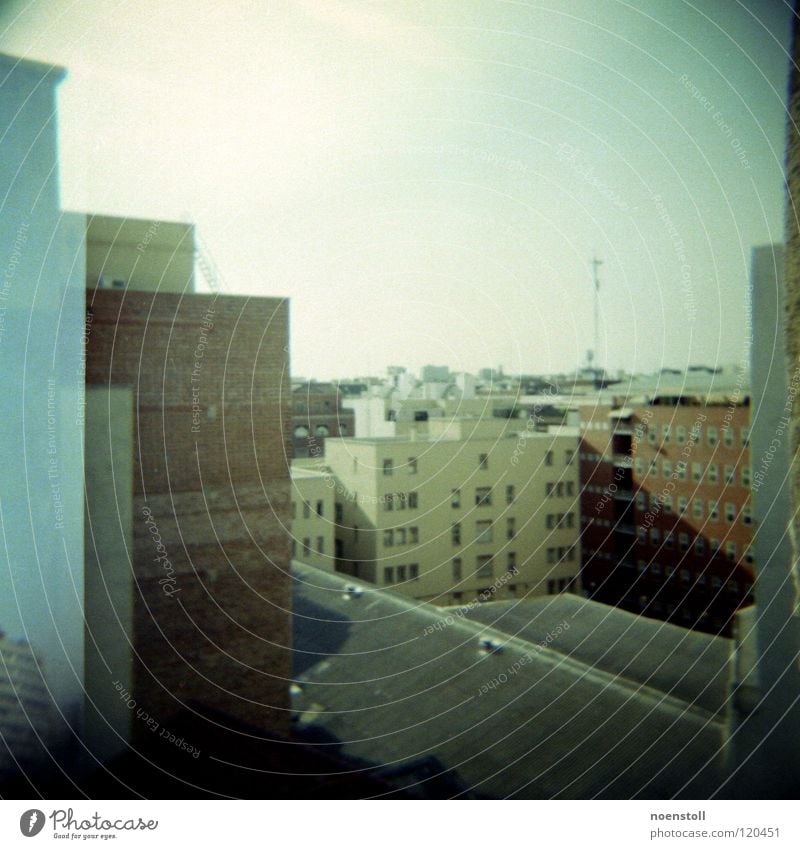 view in madrid Vantage point Town Madrid Antenna Roof Tar paper Wall (building) Brick Window Glazed facade Frontal High-rise Holga Vignetting Medium format