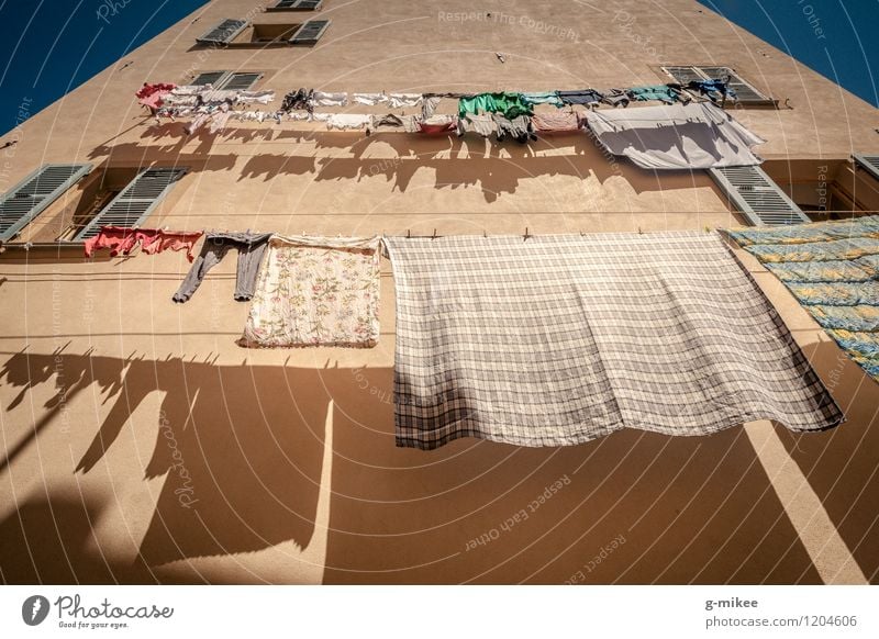 Laundry on the line France Village House (Residential Structure) Hang Yellow Clothesline Washing Dry Wall (building) Housekeeping Colour photo Exterior shot