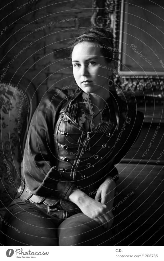 Portrait from another time Young woman Youth (Young adults) 18 - 30 years Adults Pants Blouse Corsage Chignon Sit Dark Historic Black White Past