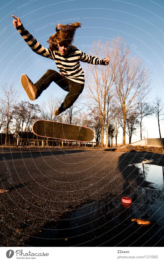 360 Flip II Moody Action Skateboarding Contentment Kickflip Salto Jump Striped Tar Concrete Tree Wide angle Youth (Young adults) Sports Puddle Reflection Speed