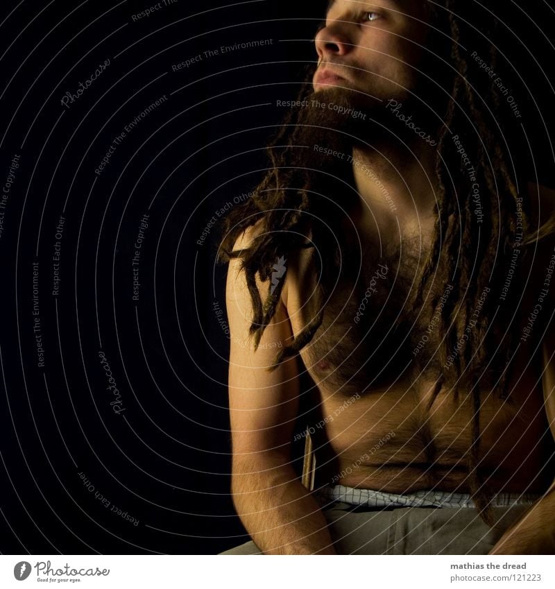 --> WATCHING<-- Dreadlocks Felt Long Dark Upper body Man Masculine Concealed Facial hair Beard hair Unshaven Visual spectacle Shadow play Pants Chin Abrupt