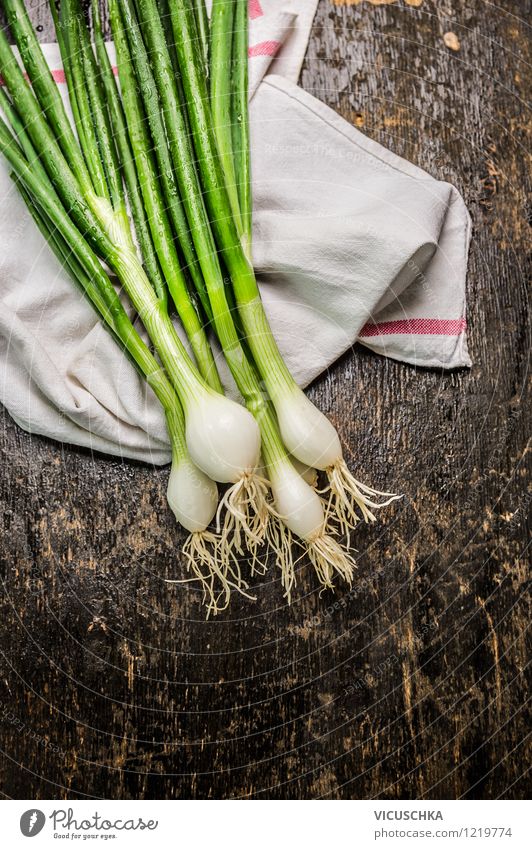 Fresh spring onions on a dark wooden table Food Vegetable Herbs and spices Nutrition Organic produce Vegetarian diet Diet Style Design Healthy Eating Life