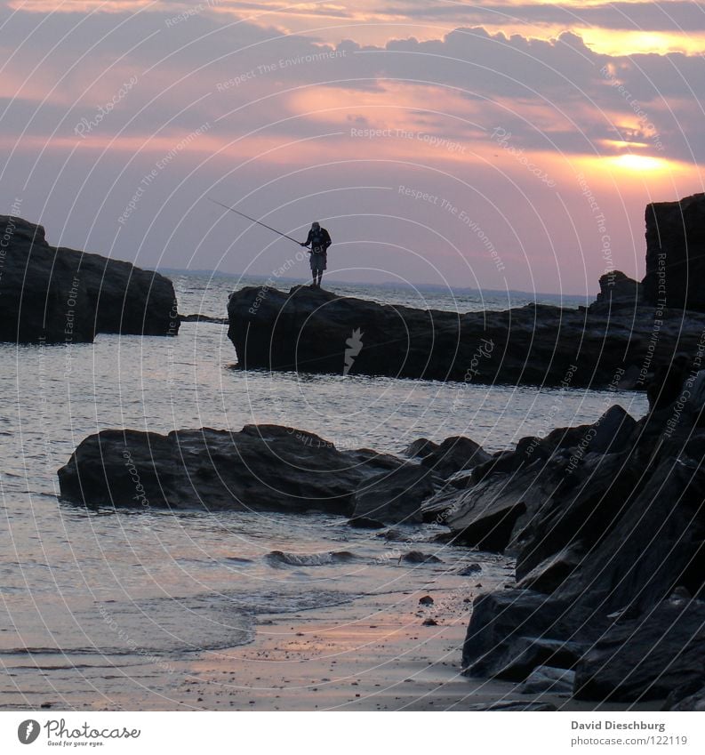 The lonely angler #II Trip Summer Beach Ocean Vacation & Travel Yellow Black Reef Reflection France Coast Clouds Sea water Angler Fishing (Angle) Fishing rod