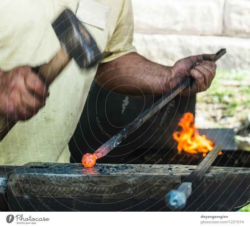 Blacksmith forges iron on anvil Work and employment Craft (trade) Tool Hammer Hand Metal Steel Old Hot Retro Red Tradition Anvil Smithy glowing Heat equipment