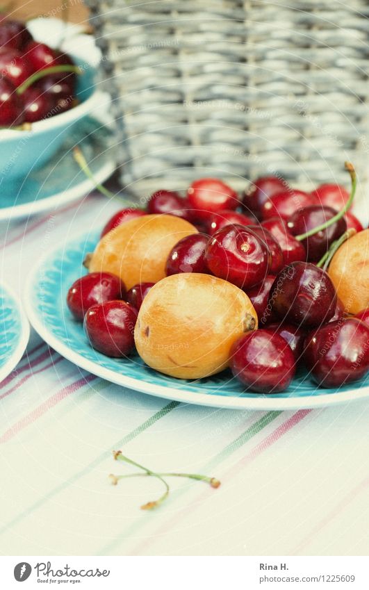 Cherries & medlars Fruit Organic produce Vegetarian diet Crockery Plate Bowl Fresh Delicious Sweet Cherry Basket Tablecloth Colour photo Exterior shot Deserted