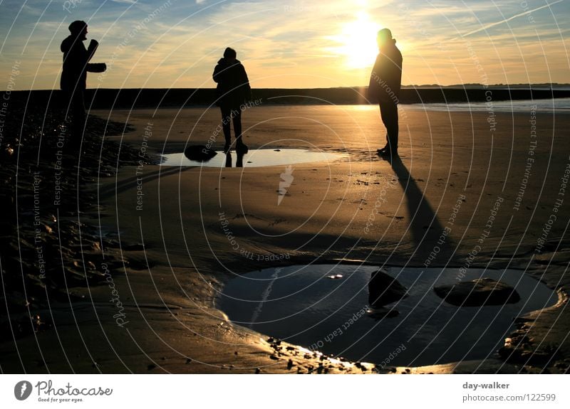 Mission to Mars Ocean Beach Waves Reflection Moody Twilight Sunset Clouds Group Coast Earth Sand Tracks Beach dune Human being Silhouette Shadow Contrast Water