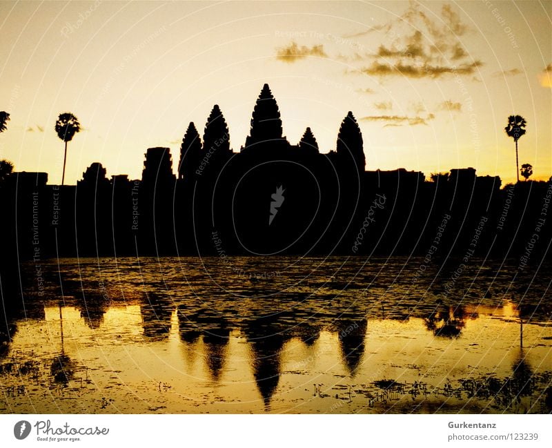 Khmer Skyline Angkor Wat Cambodia Asia Reflection Temple Dusk Sunset Evening sun Lake Khmer people Monument Landmark House of worship Shadow Water Tower