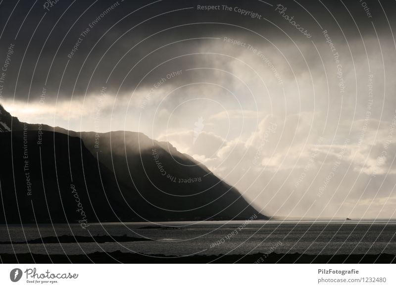 Loosening Landscape Sky Clouds Sun Weather Rain Rock Mountain Coast Ocean Cold Apocalyptic sentiment Nature Time Lofotes Norway Colour photo Exterior shot