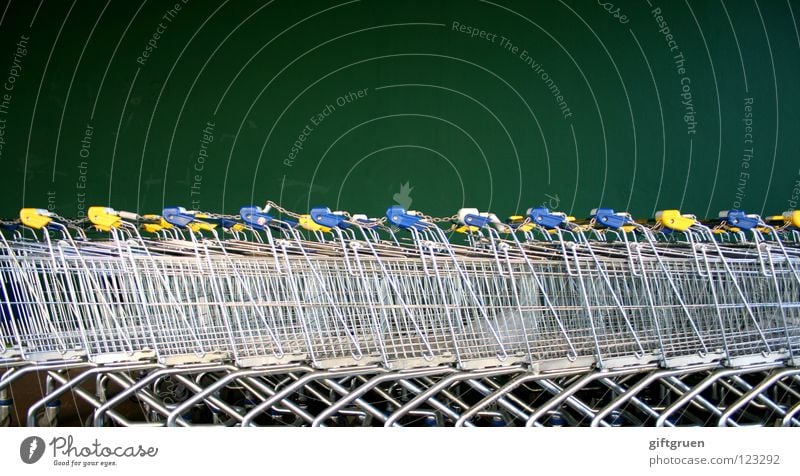 fleet Shopping Trolley Metal Green Supermarket Carriage Wall (building) Consumption Containers and vessels Shopaholic Row Beaded Sequence Structures and shapes