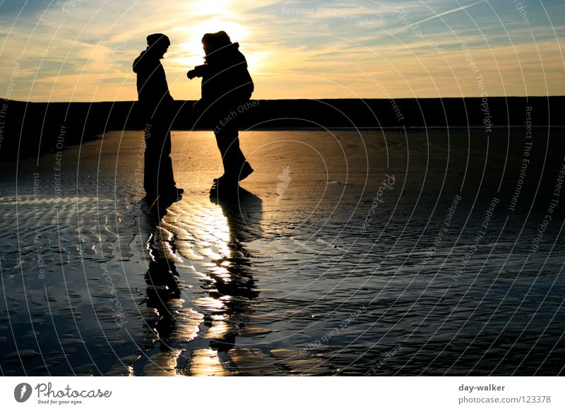 day-walker´s II Ocean Beach Waves Reflection Moody Twilight Sunset Clouds Earth Sand Coast Tracks Beach dune Human being Silhouette Shadow Contrast Water Sky