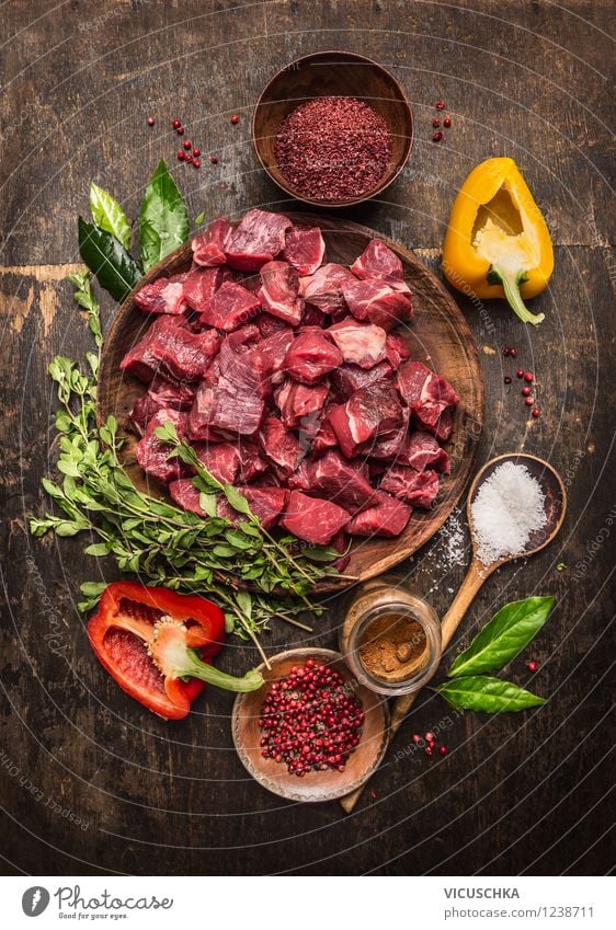 Ingredients for goulash - meat cubes, herbs and vegetables. Food Meat Vegetable Herbs and spices Nutrition Lunch Dinner Banquet Organic produce Bowl Mug Glass