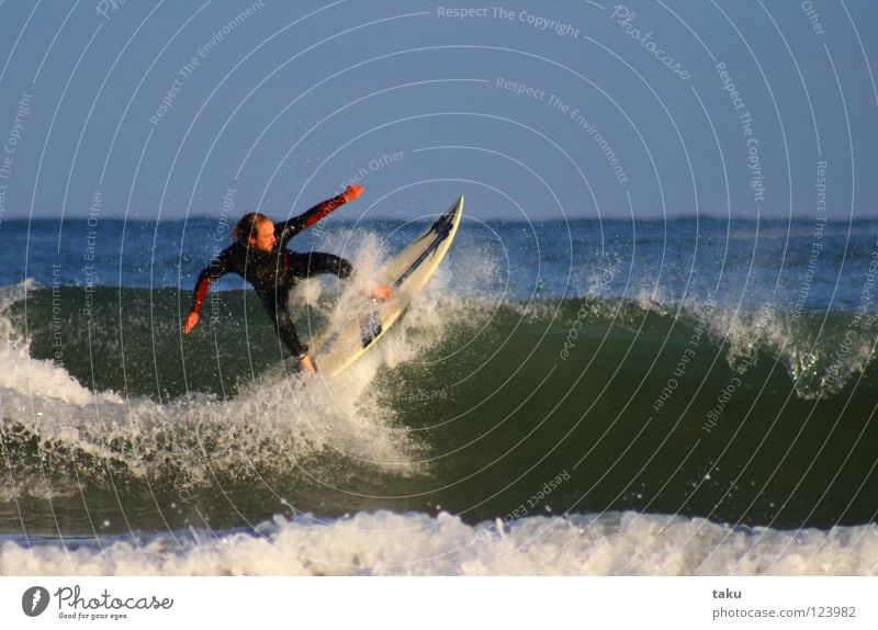 .......YEEEEEEAAAHHH I ..... New Zealand Surfer Surfboard Jump Summer Sports Aquatics p.b. damon exciting sun sea waves big waves blue wetsuit cold water