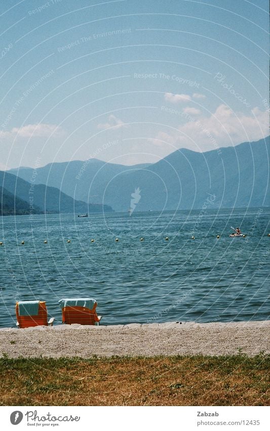 beach Deckchair Watercraft Clouds Vacation & Travel Switzerland Canton Tessin Mountain Sand Lawn