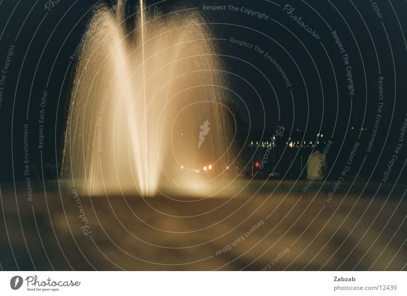 Fountain at night Well Light Geneva Night Switzerland Long exposure Physics Romance Garden Park Water Volcano Warmth