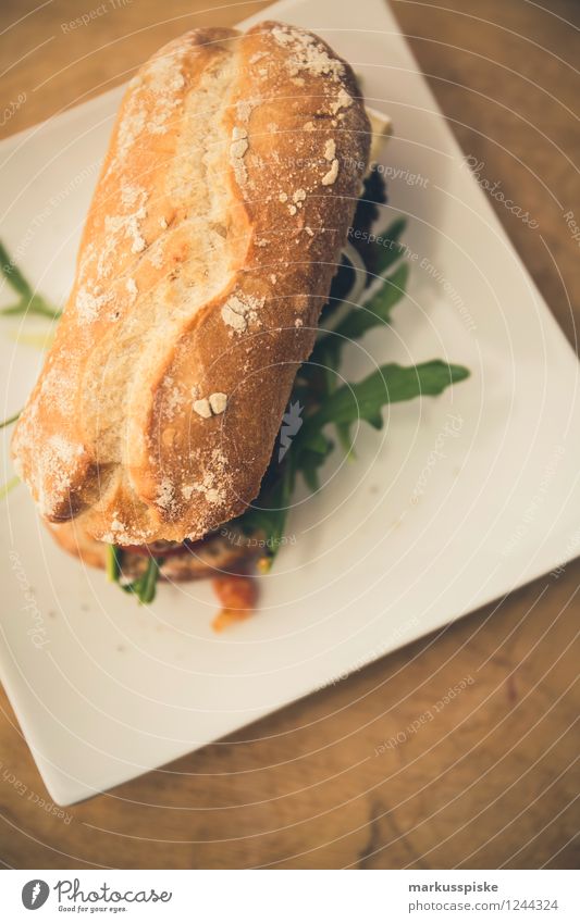 burger with tomato sugo, rucola, goat cheese Food Meat Vegetable Rucola Goat`s cheese ciabatta crusty tomatensugo Self-made Minced meat Picnic Organic produce