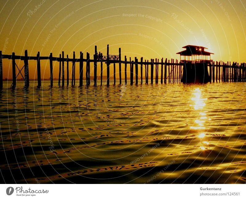 solar power station Myanmar Mandalay Teak Wood Wooden bridge Asia Dusk Lake Back-light Light Bridge Celestial bodies and the universe u-leg Pole Evening Water