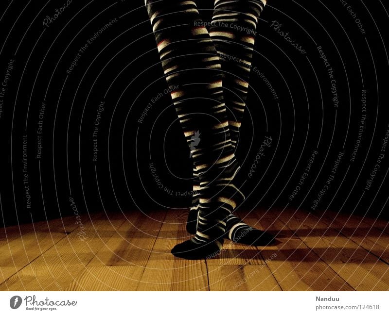 La danse des chaussettes trippeln Stockings Striped socks Sock Ballet Parquet floor Stage Dark Floodlight Dance Low-key Art Culture Playing Legs Feet