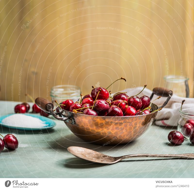 Sweet cherries in pot on kitchen table Food Fruit Nutrition Organic produce Beverage Juice Pot Glass Spoon Style Healthy Eating Life Summer Table Kitchen