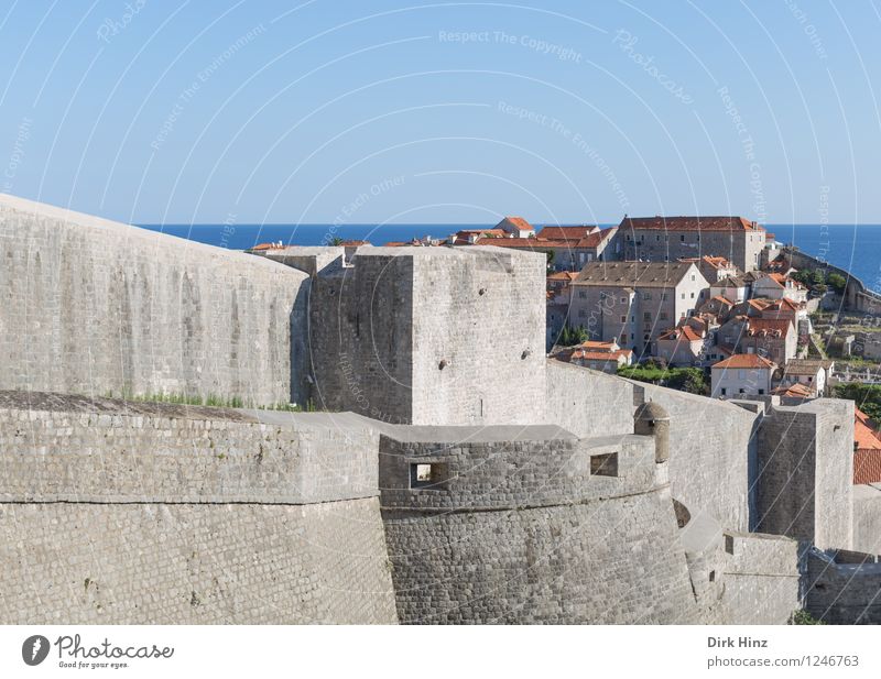 City wall - World Heritage Dubrovnik Old town Wall (barrier) Wall (building) Tourist Attraction Landmark Monument Blue Gray Horizon Testing & Control War