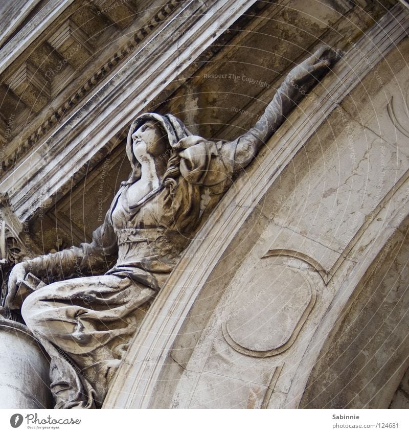 desperate deed Venice Woman Cape Hand Salute Hooded (clothing) Dress Statue Detail House of worship Stone Arm Basilica Santa Maria della Salute