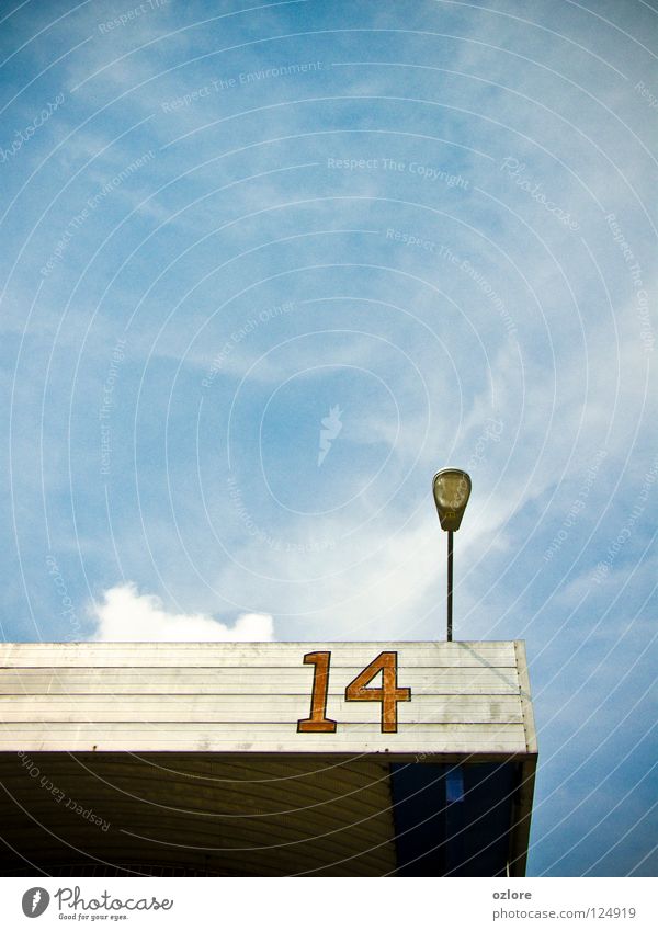 looking up to 14 Station Sky Light Industry number14 blue structure red number clouds