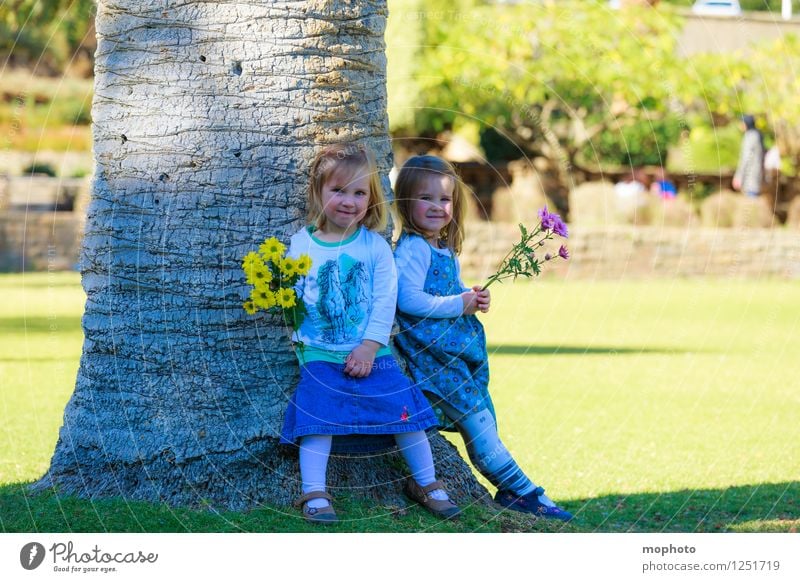 sisters Playing Parenting Child Human being Feminine Toddler Girl Brothers and sisters Sister Family & Relations Infancy 2 1 - 3 years Nature Flower Garden Park