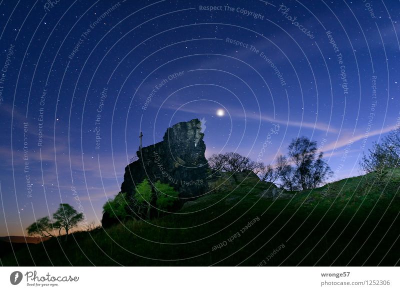 Night magic Nature Landscape Sky Night sky Stars Horizon Moon Beautiful weather Rock Crucifix Peak cross Blue Green Black White Night shot Long exposure Tripod