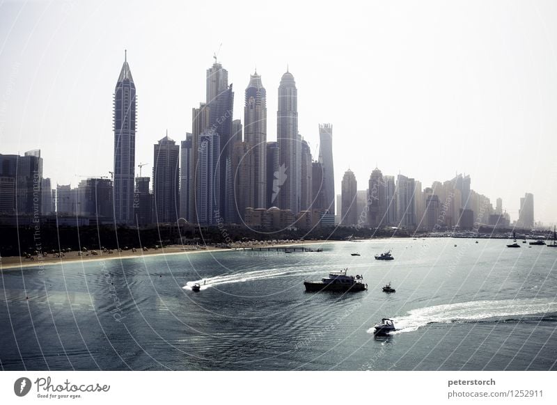 skyline Vacation & Travel Tourism City trip Water ski Sky Coast Dubai Marina Capital city Skyline High-rise Sport boats Yacht Exceptional Gigantic Maritime