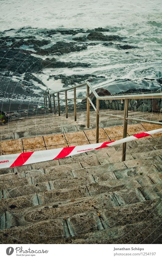 Tenerife XLV Town Esthetic Ocean Barrier Handrail Banister Red Respect Waves Gale Shielded Stairs Stone steps Downward Spain Atlantic Ocean Rough Cold Contrast