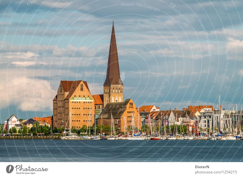 On the other bank Rostock Town Downtown Old town Deserted Church Harbour Manmade structures Building Architecture Tourist Attraction Landmark Blue Brown Gold