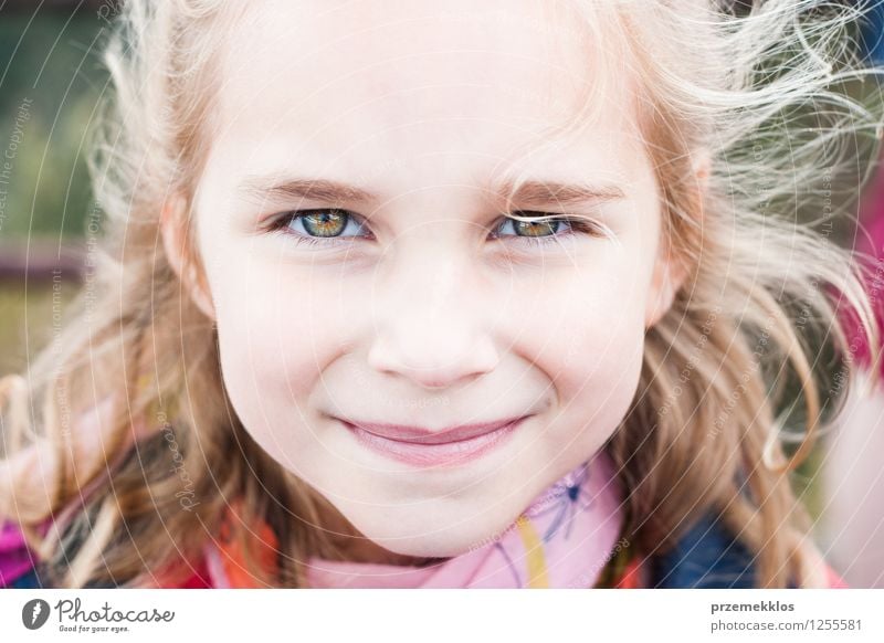 Portrait of little girl looking at camera Beautiful Child Girl 1 Human being Smiling Small Cute cheerful horizontal Colour photo Exterior shot Close-up