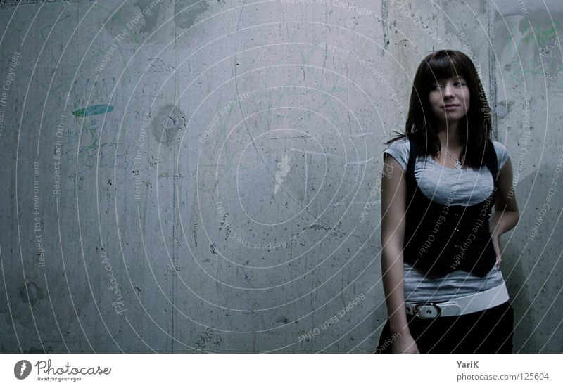 grey in grey Concrete wall Gray Woman Wall (building) Wall (barrier) Posture Gesture Photo shoot Portrait photograph Mini skirt Dark Neon light Exposure Subsoil