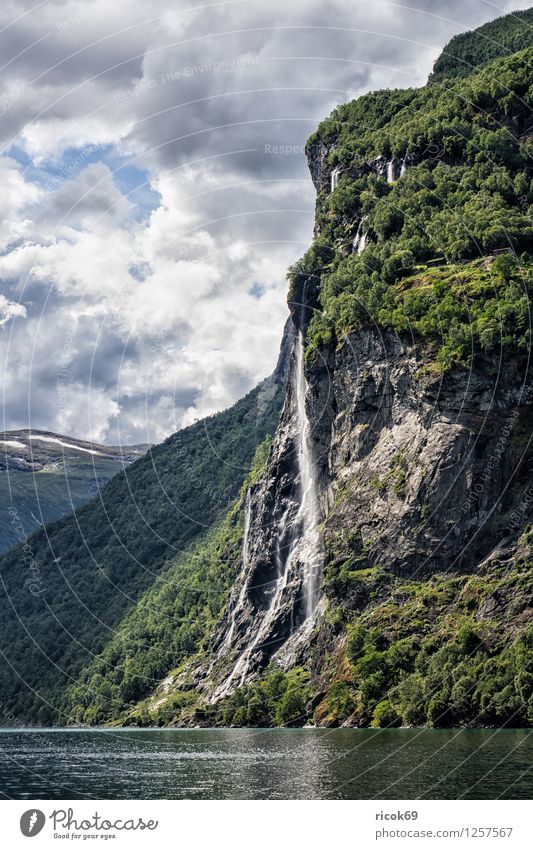 Waterfall in the Geirangerfjord Relaxation Vacation & Travel Mountain Nature Landscape Clouds Fjord Idyll Norway Seven Sisters Møre og Romsdal destination Sky