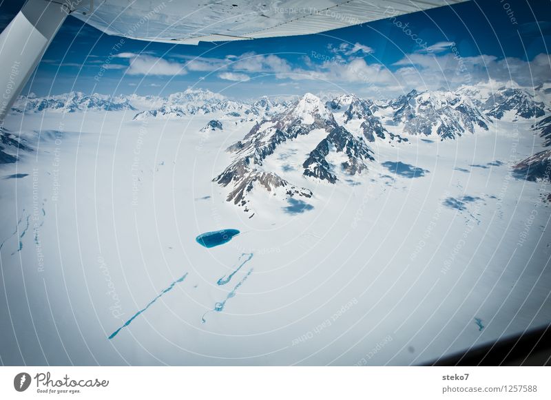 Glacier Country X Mountain Snowcapped peak Lake Flying Gigantic Cold Blue White Loneliness Uniqueness Far-off places Alaska glacial lake Wing tip