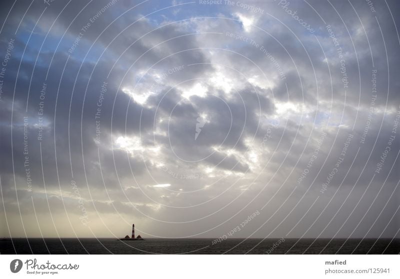 surrounded Gale Lighthouse Waves Clouds Flood Westerhever Dike North Frisland Loneliness Ocean North Sea murder lake Emma Water Sky Sun Wind High tide pitched