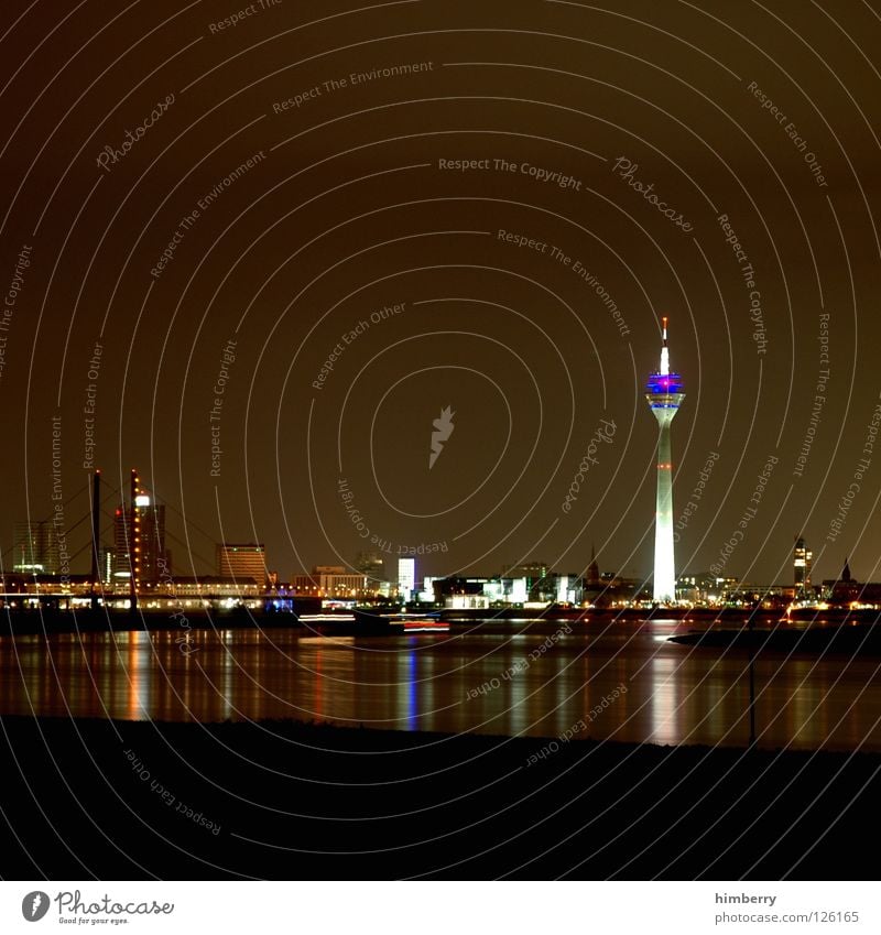 skyline chase Rheinturm Town Lifestyle Night life Transmit Transmitting station Long exposure Exposure Duesseldorf Modern Bridge Rhine Evening Street Blue