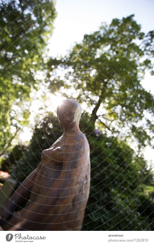 statue Androgynous Tree Park Wait Esthetic Naked Calm Statue Sky Blue Green Cemetery Hamburg Ohlsdorf Cemetery Colour photo Exterior shot Deserted